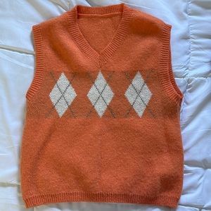 Orange sweater vest